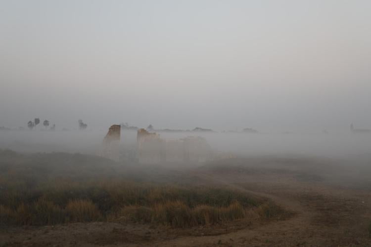 Hermopolis covered in mist