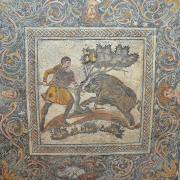 mosaic depicting a boar hunt, Carole Raddato from FRANKFURT, Germany, CC BY-SA 2.0 <https://creativecommons.org/licenses/by-sa/2.0>, via Wikimedia Commons