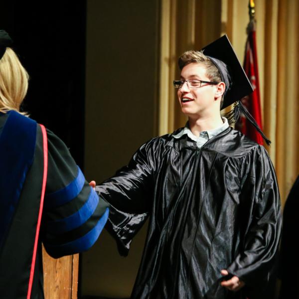 Receiving his degrees