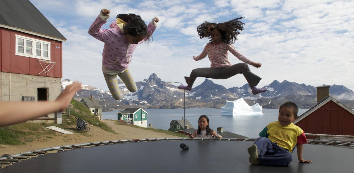 children jumping on the trampoline in eastern Greenland