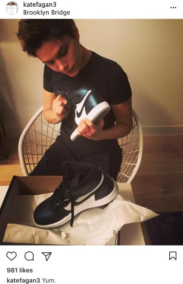 Fagan examines new shoes. Photo is from her Instagram account.