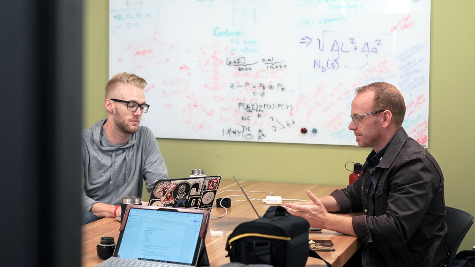 Jed working with a student