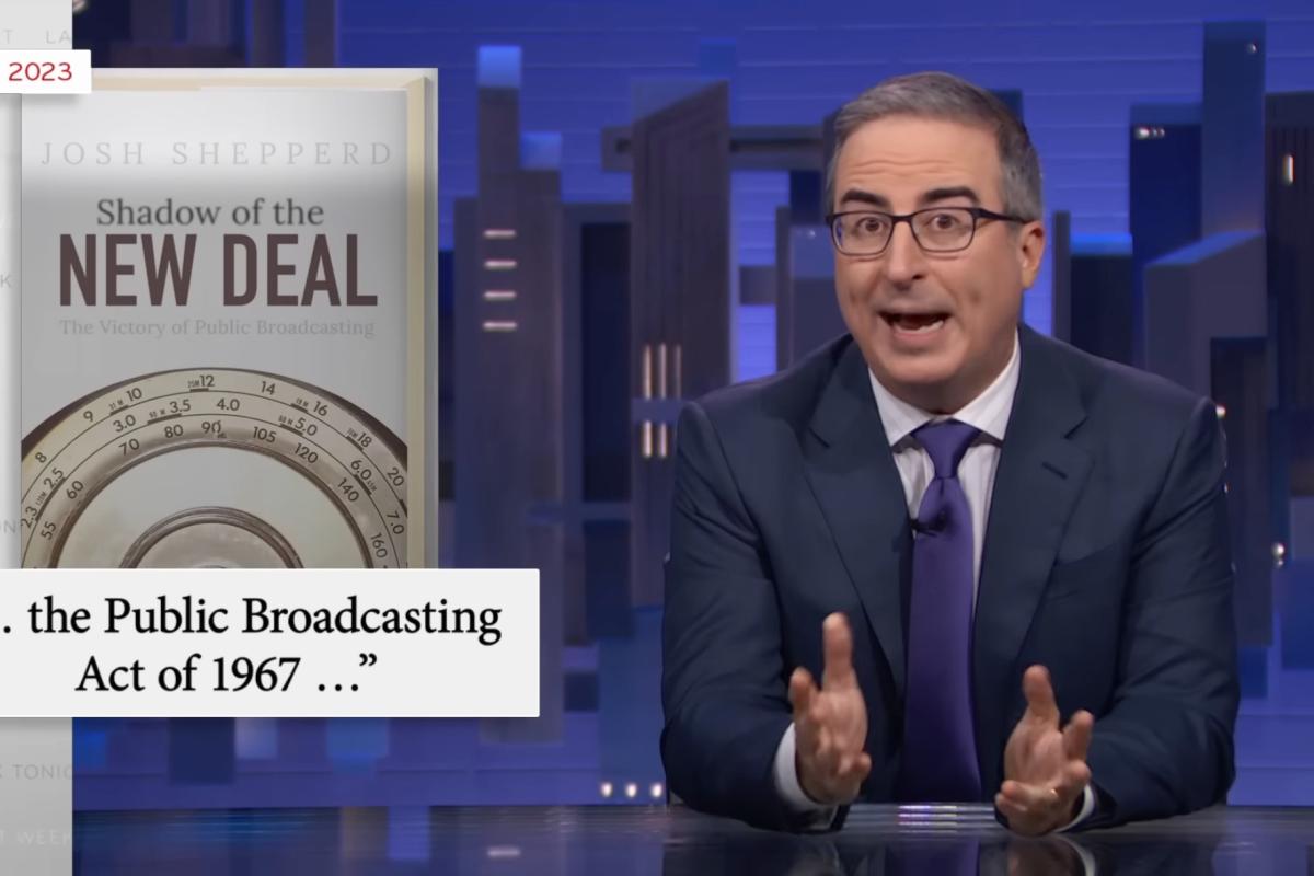 John Oliver on ths set of his show. Josh Shepperd's book is an on-screen graphic at top left.