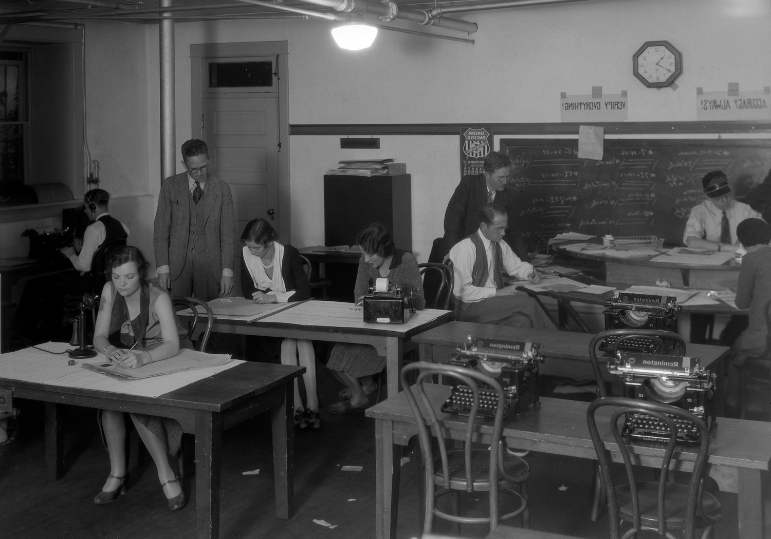 Journalism students sit in class, circa 1920s