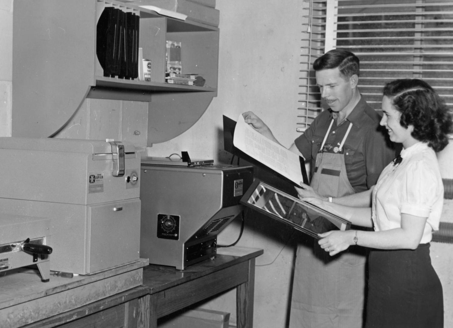 Journalism students work at newspaper, circa 1950s