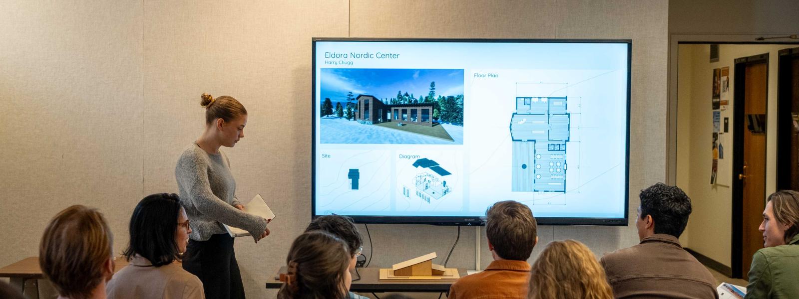 Faculty at a presentation