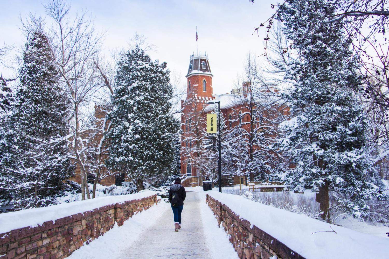 Student walks across Bridge