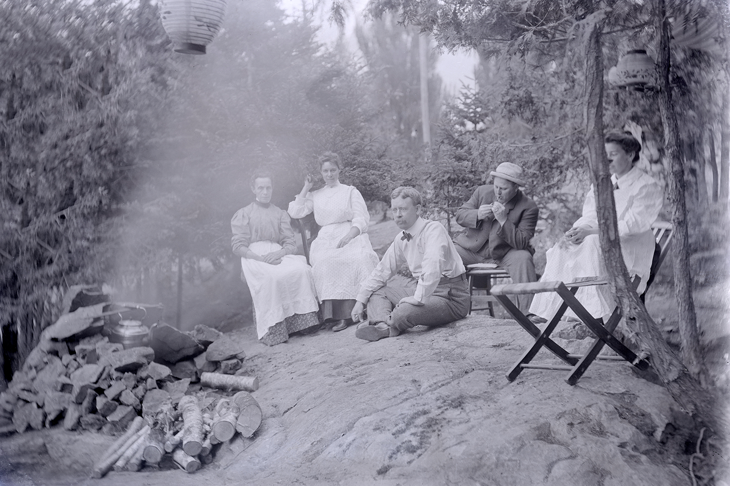 historic photo of people camping