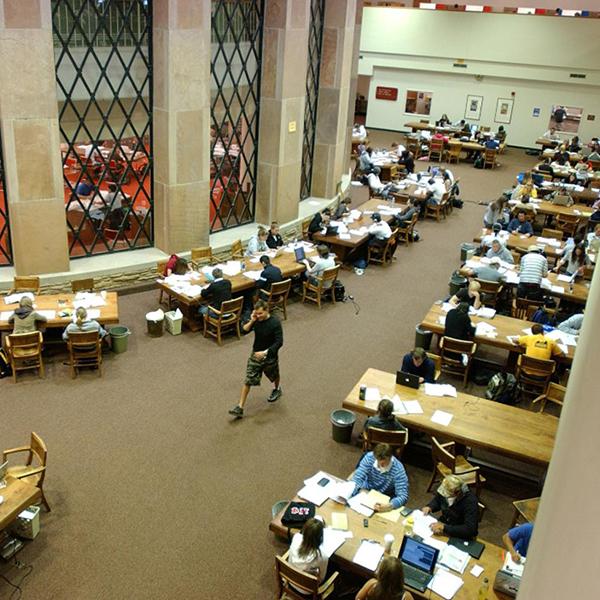People studying indoors at Norlin Library