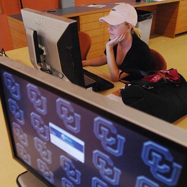 student using desktop computer