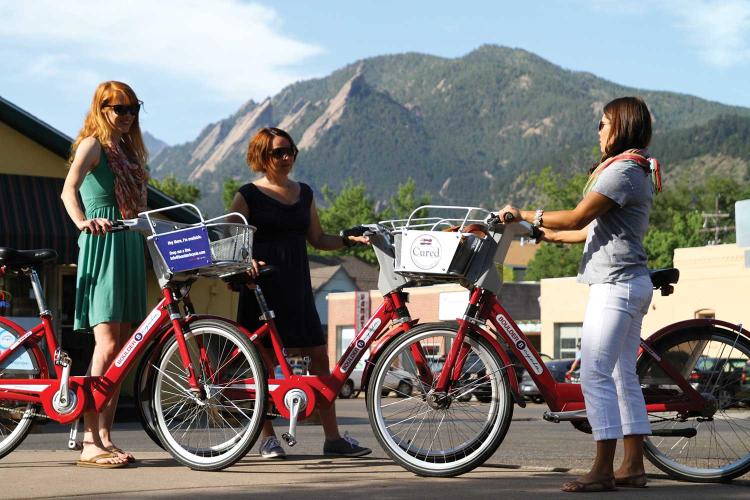 Women testing out their B-Cycle bikes
