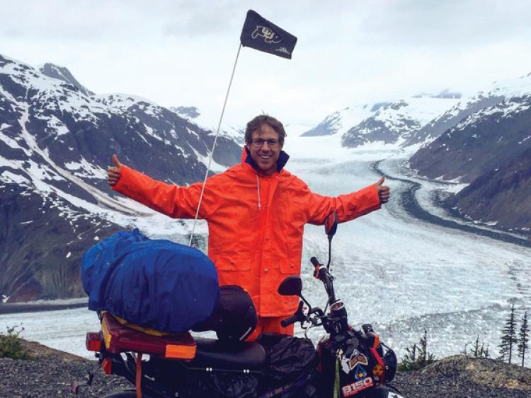 Shearon with his scooter in Alaska 