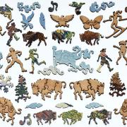 die cut puzzle pieces in intricate shapes 