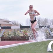 Erin Clark running in track and field