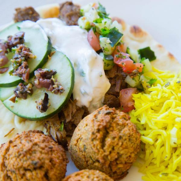 Falafel, saffron rice, tomato cucumber salad, yogurt sauce