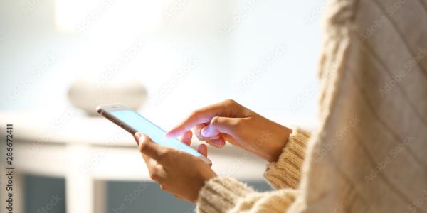 Photo of a person using the WellTrack app.