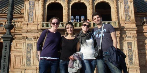A group of students poses in the Plaza Espana in Seville, Spain.
