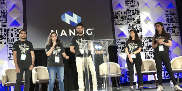 network engineering students presenting at NANOG for winning hackathon