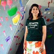 Bhavna Chhabra near the indoor climbing wall at Google in Boulder. Photo by the Daily Camera 