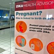 A Zika virus health advisory posted near an airport security checkpoint in San Juan, Puerto Rico, in 2016