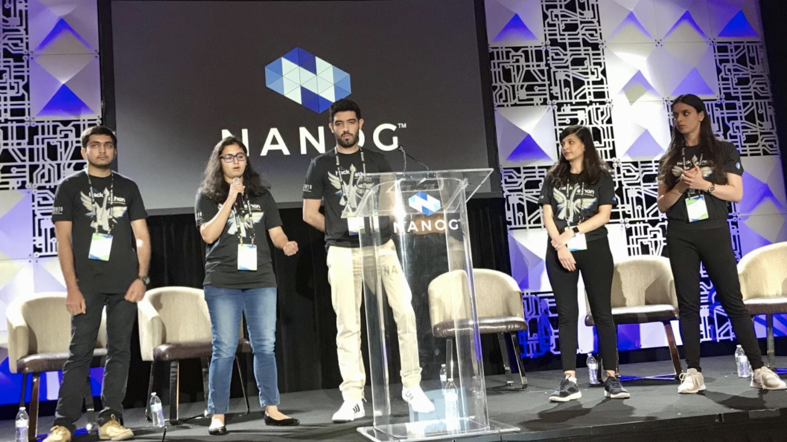 network engineering students presenting at NANOG for winning hackathon