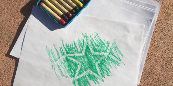 rubbing with green crayon