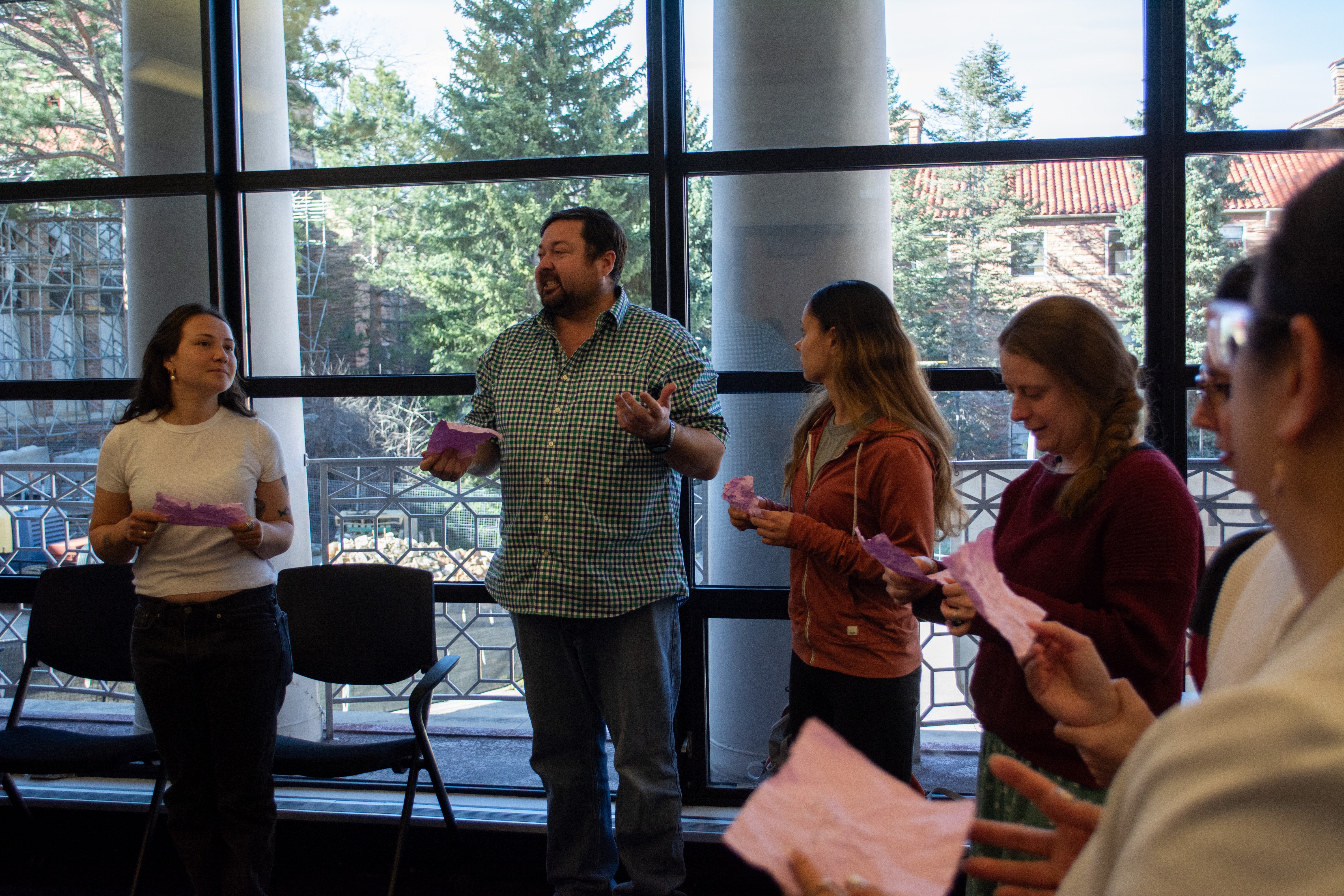 standing in circle talking