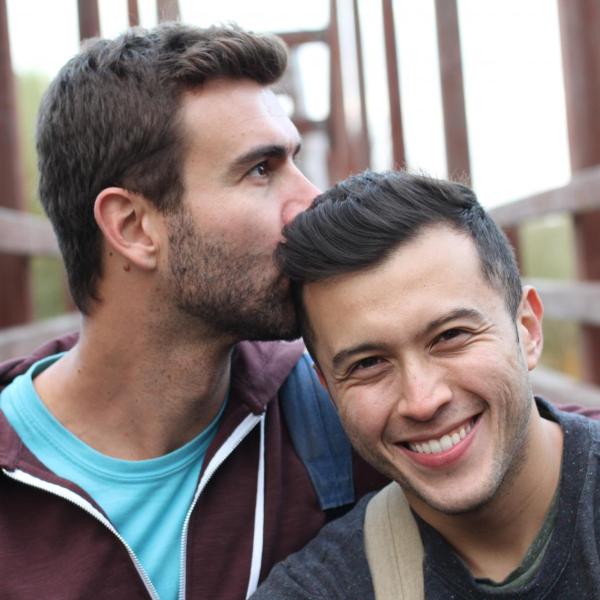 Couple smiling and hugging