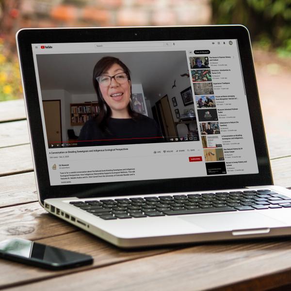 laptop with lecturer on screen