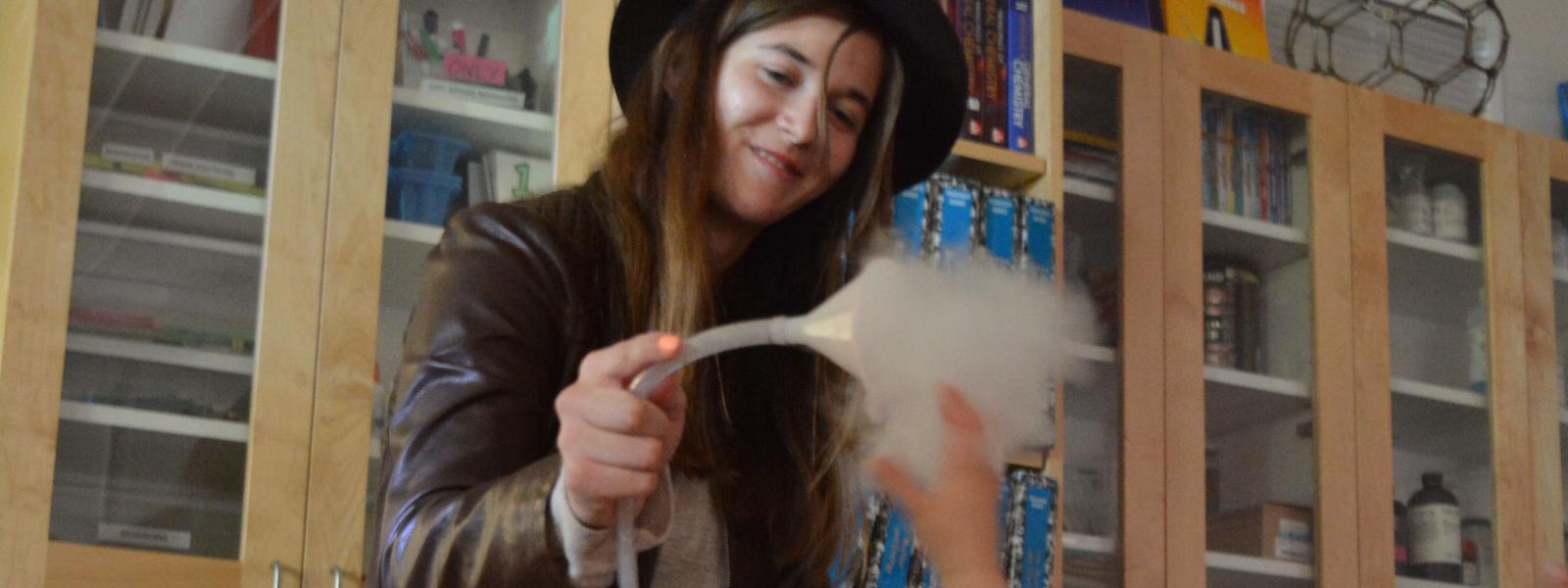 CU Teach student shares dry ice fog with child