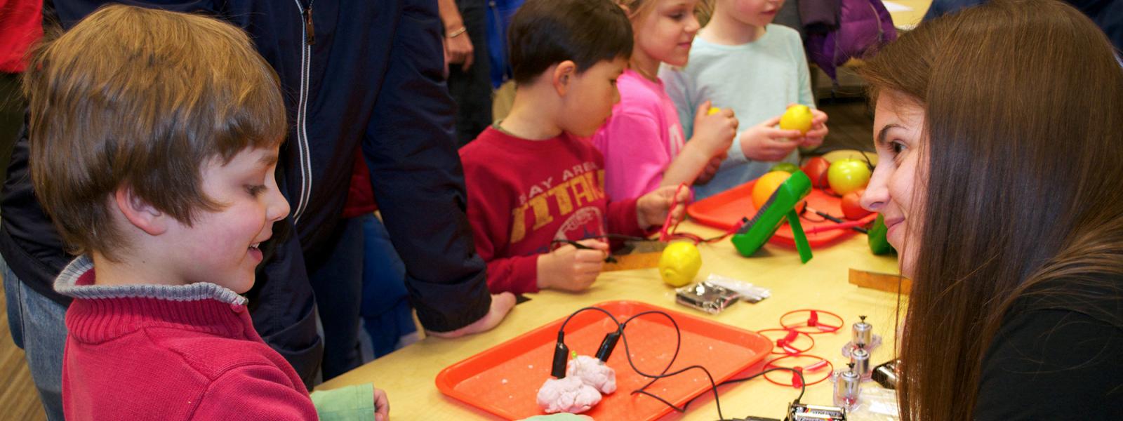 CU Teach student and child create cauliflower battery