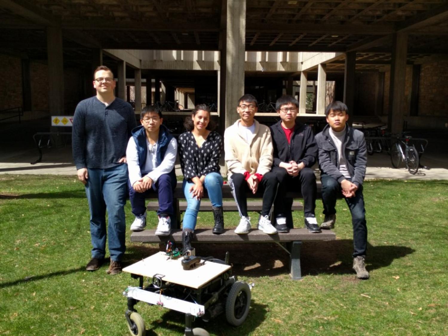 The team with their prototype outside the Engineering Center.
