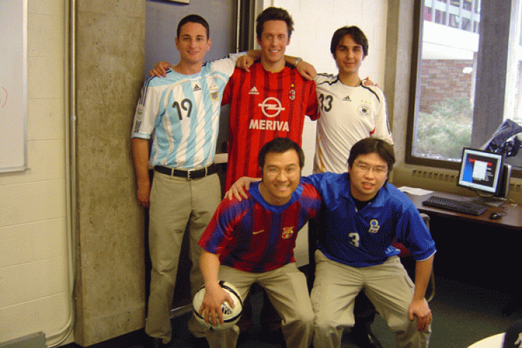 The five members of International in their soccer jerseys