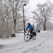 man biking in snow