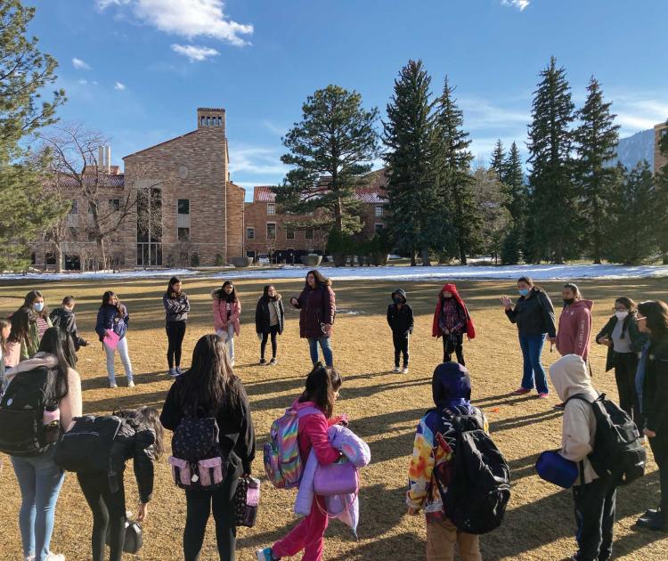 Photo of Borderless Roots group in the quad courtyard of CU Boulder