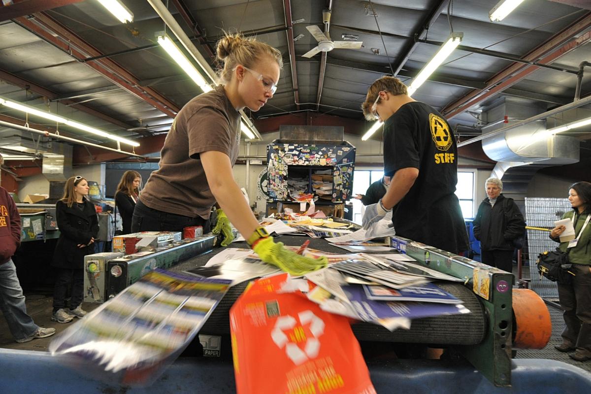 Students work in the campus recycling center