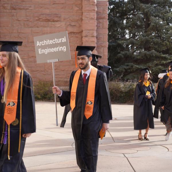 Student walking to graduation