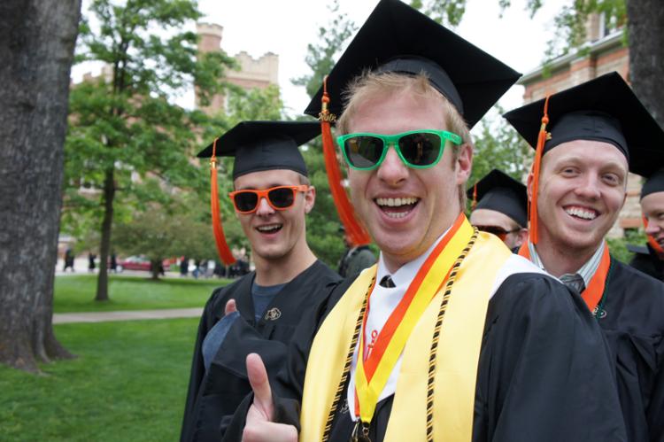 Students with graduation caps and sunglasses