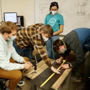 students measuring for design