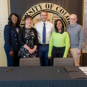 FRCC's president and CU Boulder's provost pose for a group photo with students in the CASE Chancellor's Hall