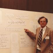 aculty member David Clough presentating research at a conference (early 1980s). 