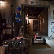 Students working in the tunnels with the drones.