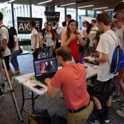 Students visit booths in the lobby during the 2017 activities fair. 