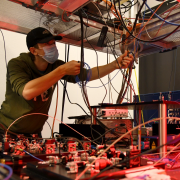 An engineer assembles a quantum processing unit in Boulder