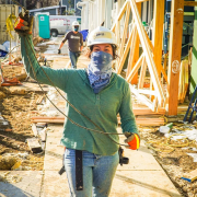 female wearing a hard hat at a project site