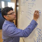 Prashant working on a whiteboard 