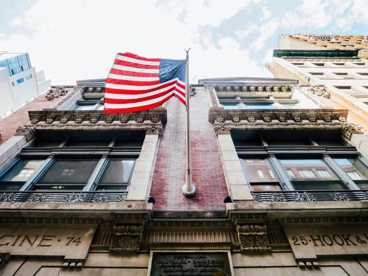 American flag flying over a building