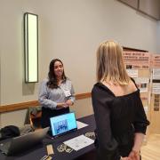 Julia Rodriguez speaking to guests at the CU Climate Expo
