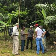 Together with colleagues from the Federal University of Acre, lead author Peter Newton talks with Sr. Dimas in his agroforest on the edge of the Amazonian forest in the state of Acre, Brazil.
