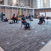 Music students practice safe COVID-safe protocols in Prof. Don McKinnney’s wind symphony class at the CU Boulder College of Music during the fall 2020 semester.